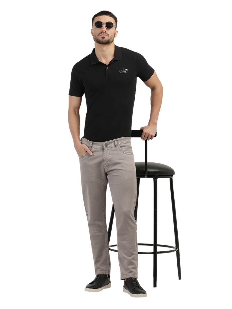 Model wearing Clarke Gable's Light Brown Tinted Skinny Fit Jeans in a casual setting