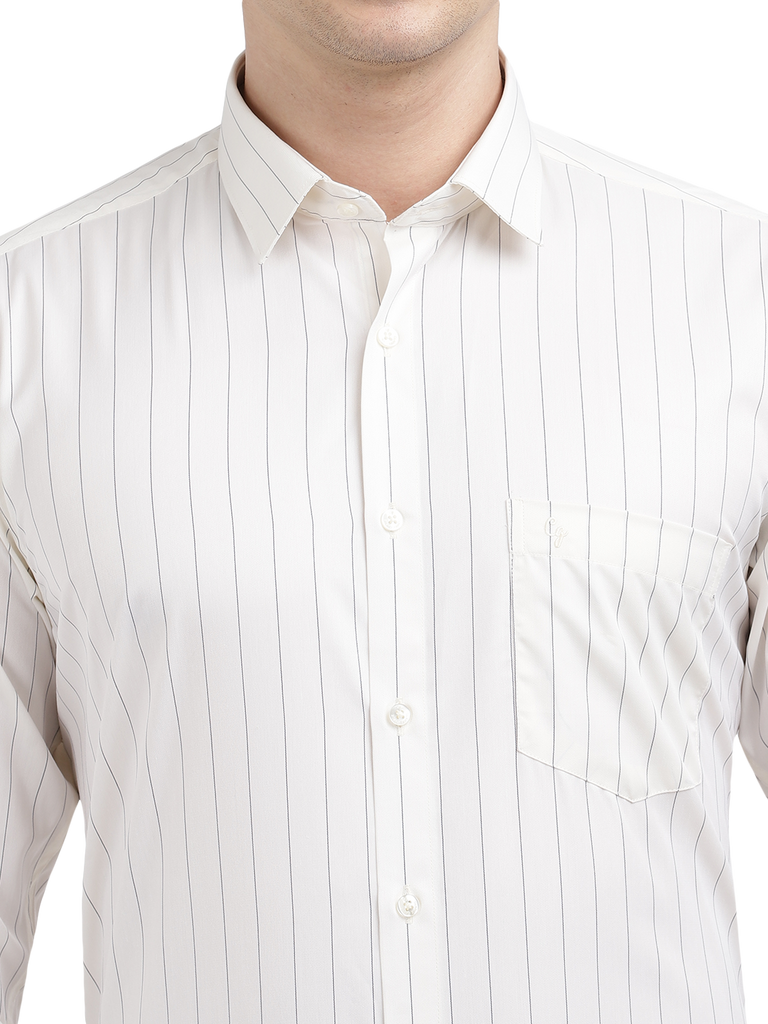 Model wearing Clarke Gable's Light Cream Striped Formal Shirt in a casual setting