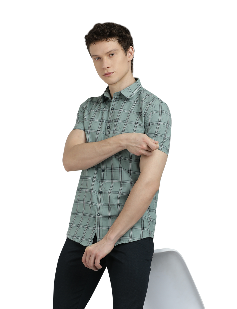 Model wearing Clarke Gable's Light Green Checked Semi Casual Shirt in a casual setting