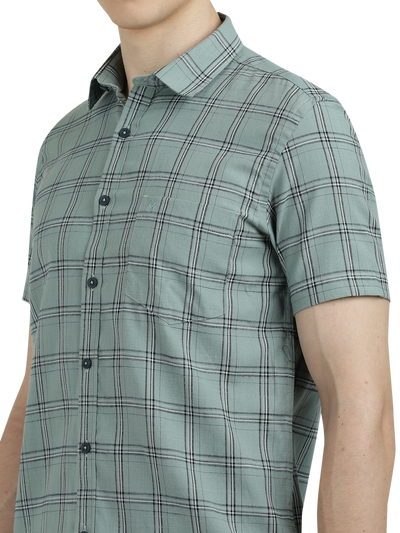 Model wearing Clarke Gable's Light Green Checked Semi Casual Shirt in a casual setting