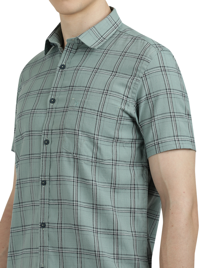 Model wearing Clarke Gable's Light Green Checked Semi Casual Shirt in a casual setting