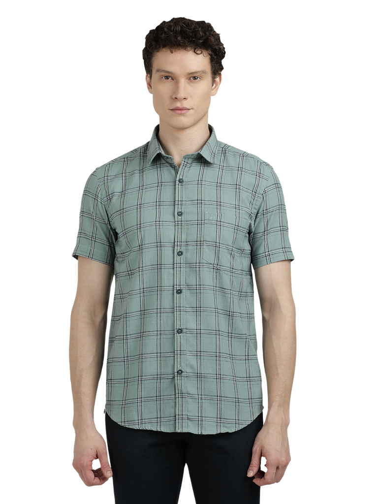 Model wearing Clarke Gable's Light Green Checked Semi Casual Shirt in a casual setting