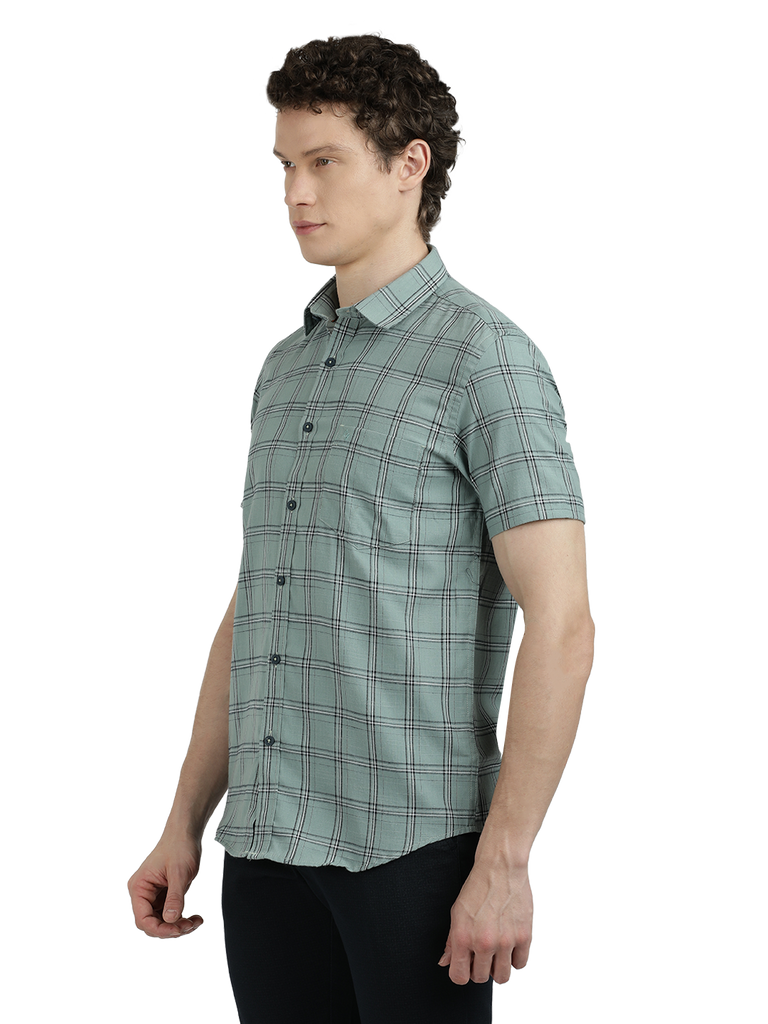 Model wearing Clarke Gable's Light Green Checked Semi Casual Shirt in a casual setting