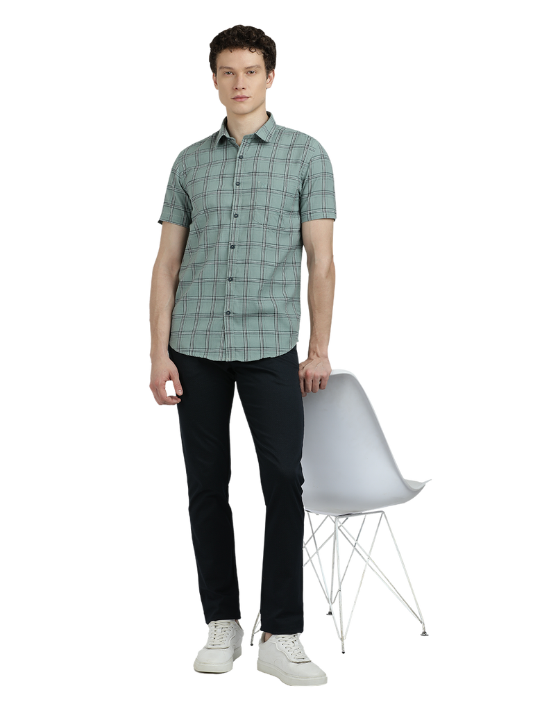 Model wearing Clarke Gable's Light Green Checked Semi Casual Shirt in a casual setting