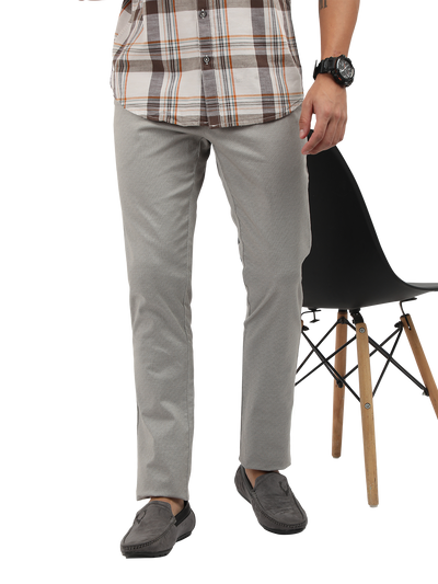 Model wearing Clarke Gable's Light Grey Custom Fit Trousers in a casual setting