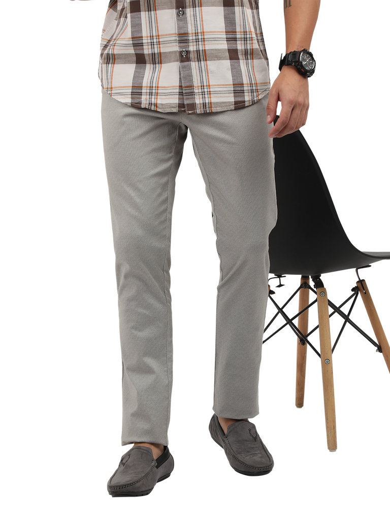 Model wearing Clarke Gable's Light Grey Custom Fit Trousers in a casual setting