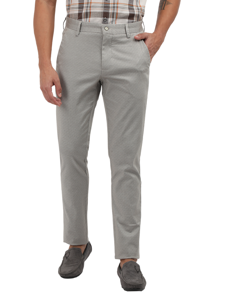 Model wearing Clarke Gable's Light Grey Custom Fit Trousers in a casual setting