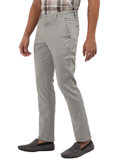 Model wearing Clarke Gable's Light Grey Custom Fit Trousers in a casual setting