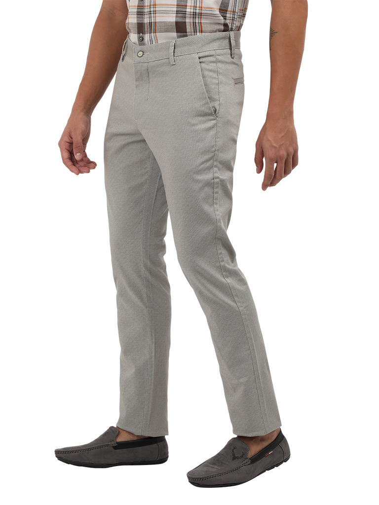 Model wearing Clarke Gable's Light Grey Custom Fit Trousers in a casual setting