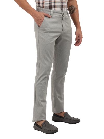 Model wearing Clarke Gable's Light Grey Custom Fit Trousers in a casual setting