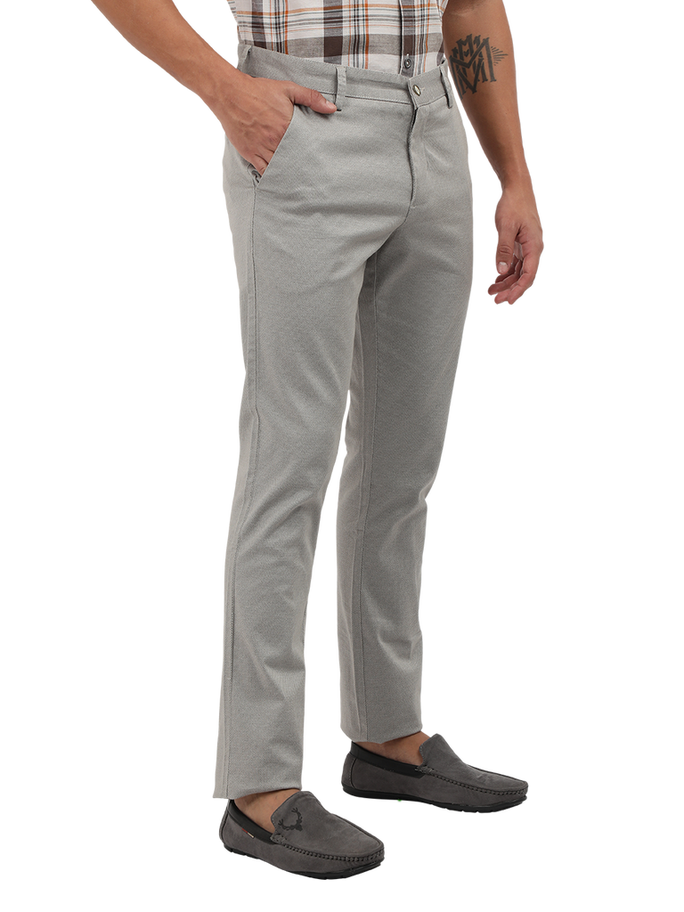 Model wearing Clarke Gable's Light Grey Custom Fit Trousers in a casual setting