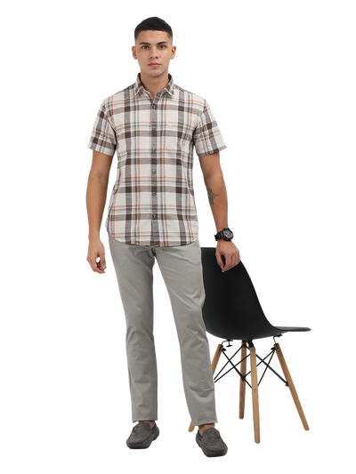 Model wearing Clarke Gable's Light Grey Custom Fit Trousers in a casual setting