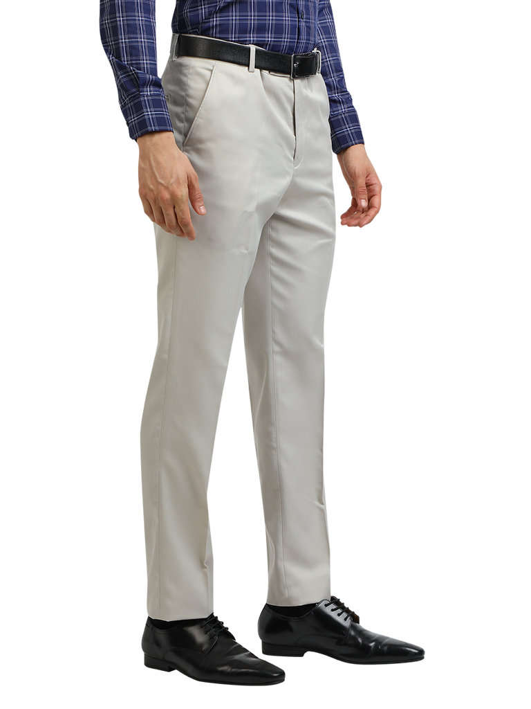 Model wearing Clarke Gable's Light Grey Smart Fit Trousers in a casual setting