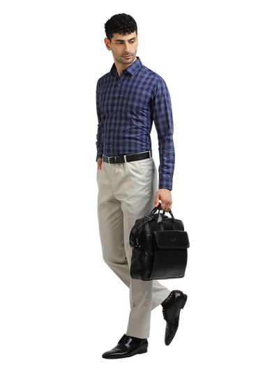 Model wearing Clarke Gable's Light Grey Smart Fit Trousers in a casual setting