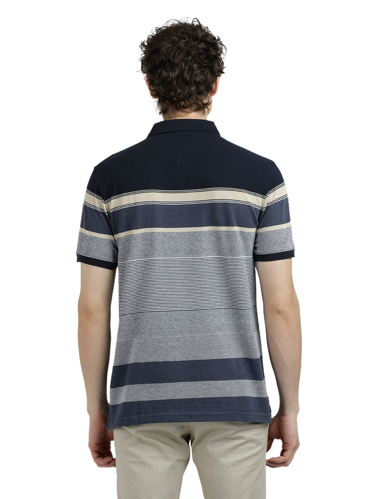 Model wearing Clarke Gable's Light Grey With Dark Grey Striped Polo Collar T-Shirt in a casual setting