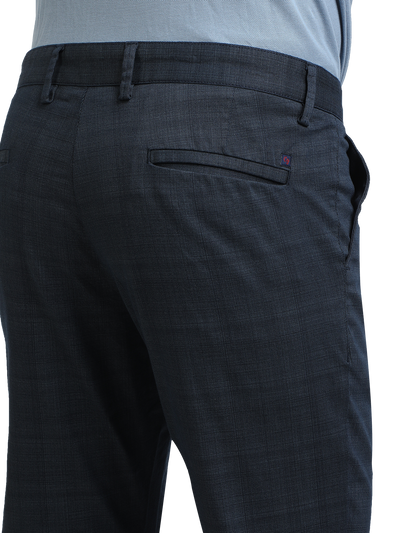 Model wearing Clarke Gable's Light Navy Custom Fit Trousers in a casual setting