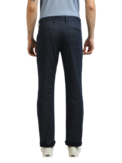 Model wearing Clarke Gable's Light Navy Custom Fit Trousers in a casual setting