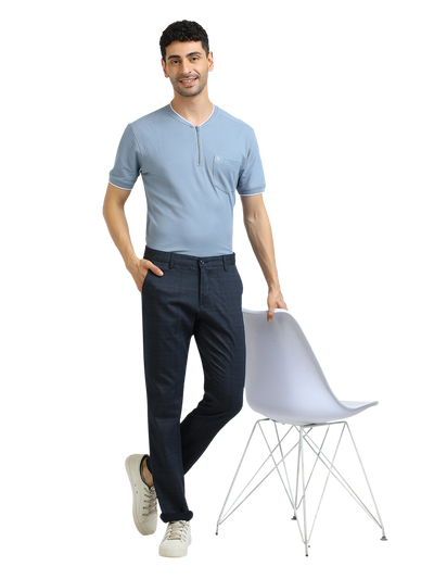 Model wearing Clarke Gable's Light Navy Custom Fit Trousers in a casual setting