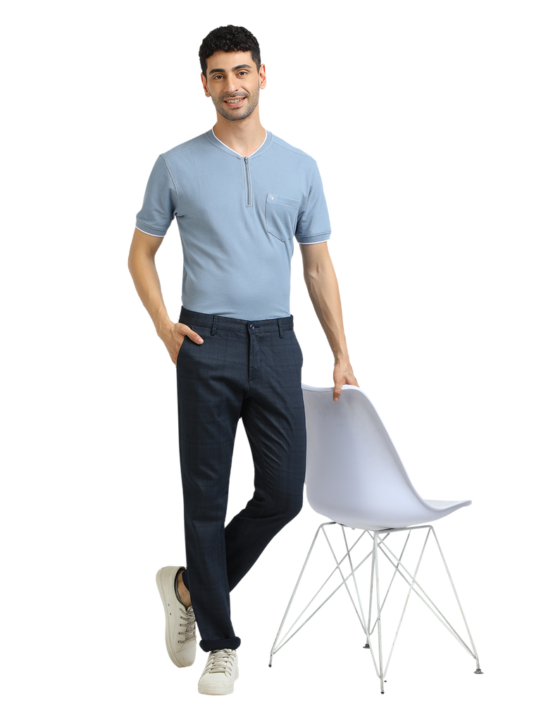 Model wearing Clarke Gable's Light Navy Custom Fit Trousers in a casual setting