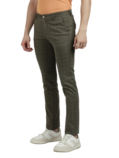 Model wearing Clarke Gable's Light Olive Trim Fit Trousers in a casual setting
