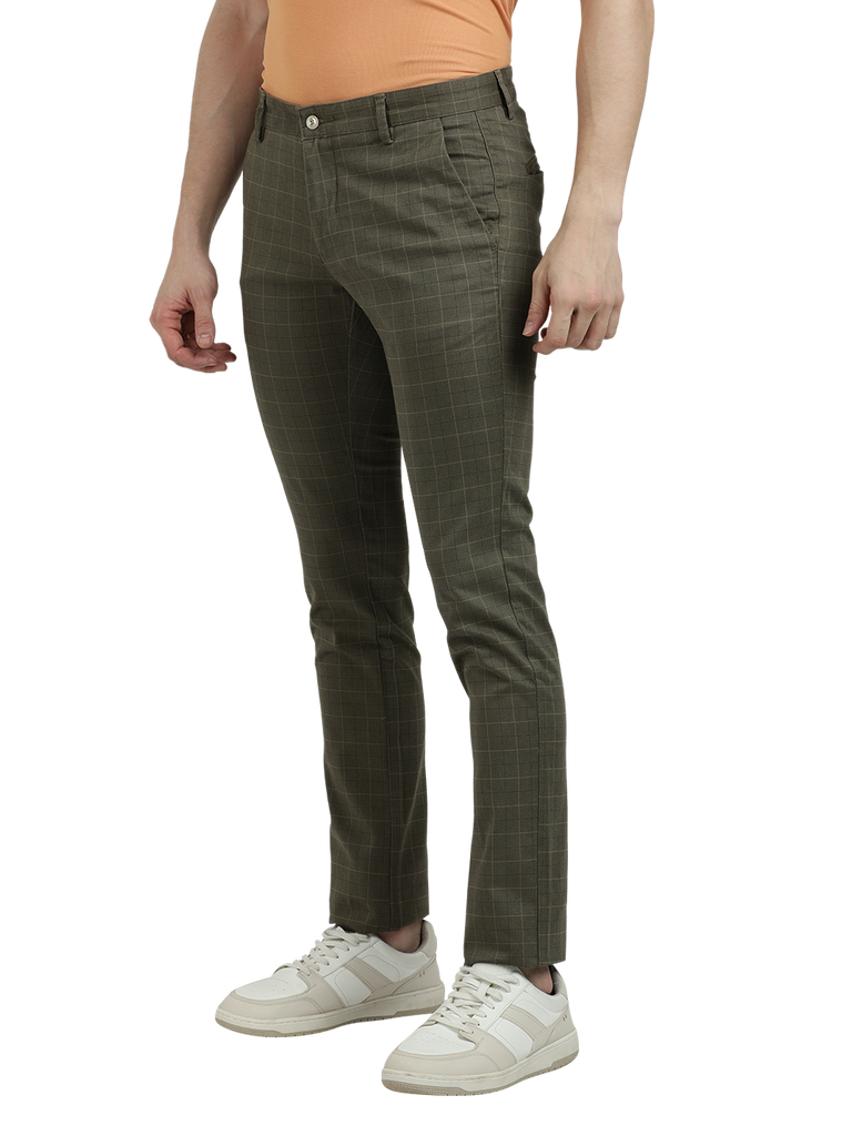 Model wearing Clarke Gable's Light Olive Trim Fit Trousers in a casual setting