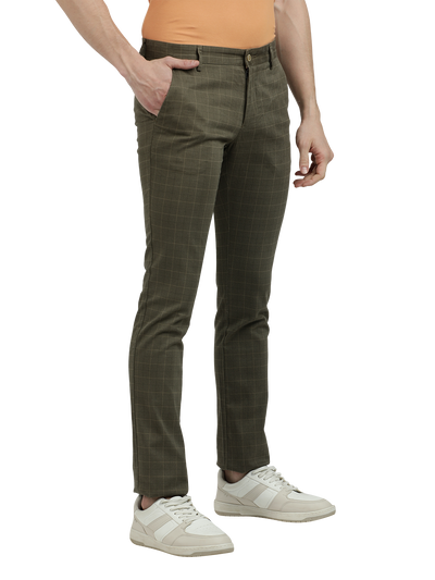 Model wearing Clarke Gable's Light Olive Trim Fit Trousers in a casual setting