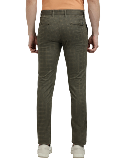 Model wearing Clarke Gable's Light Olive Trim Fit Trousers in a casual setting