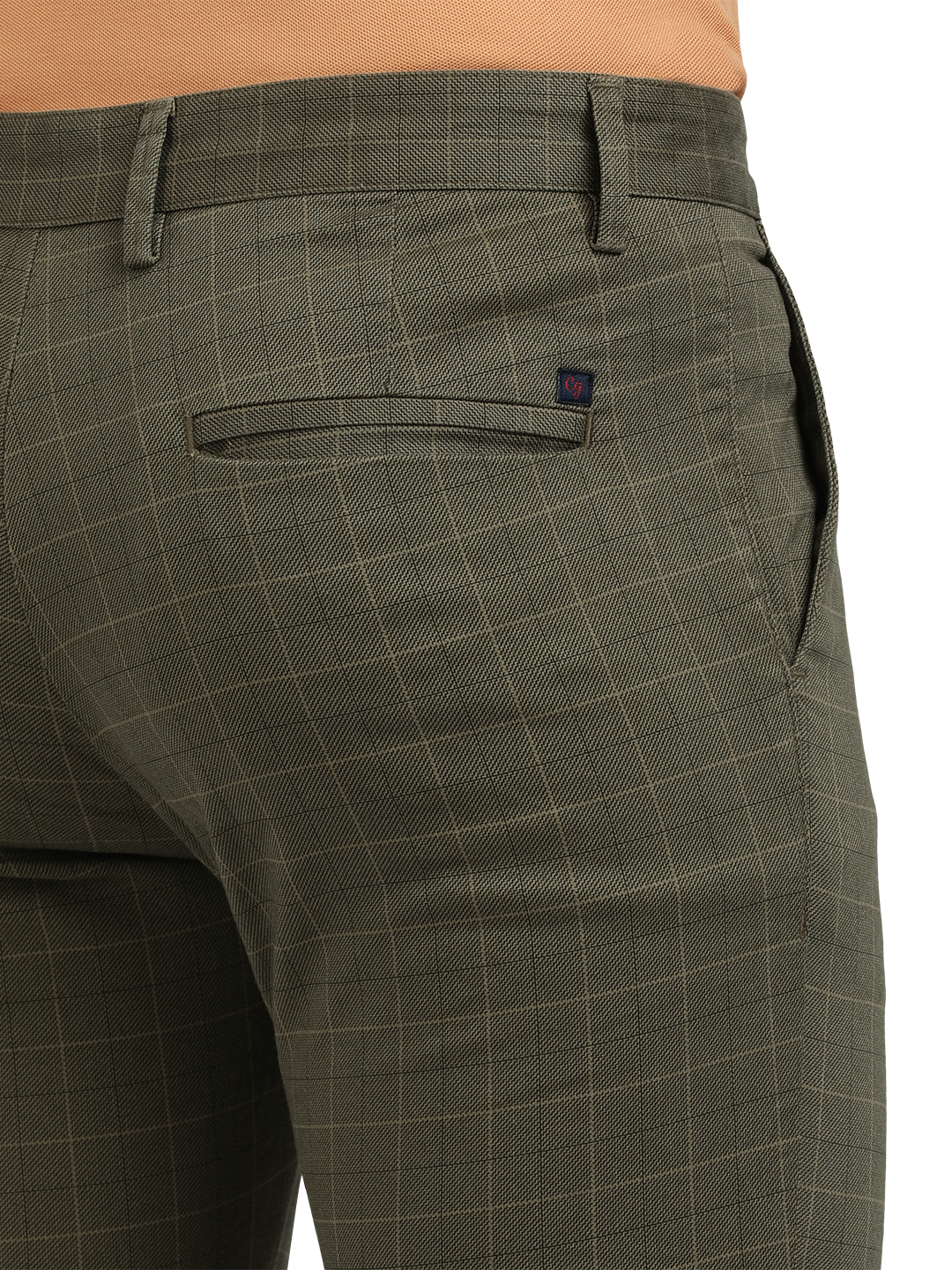 Model wearing Clarke Gable's Light Olive Trim Fit Trousers in a casual setting