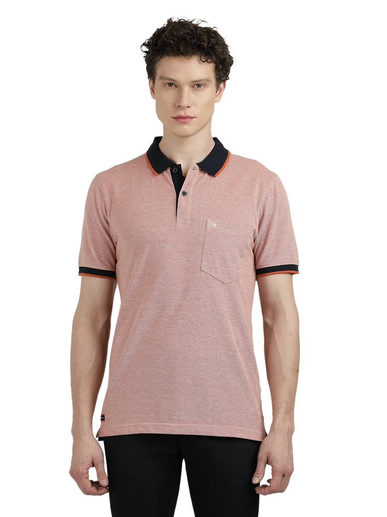 Model wearing Clarke Gable's Light Pink With Black Solid Polo Collar T-Shirt in a casual setting