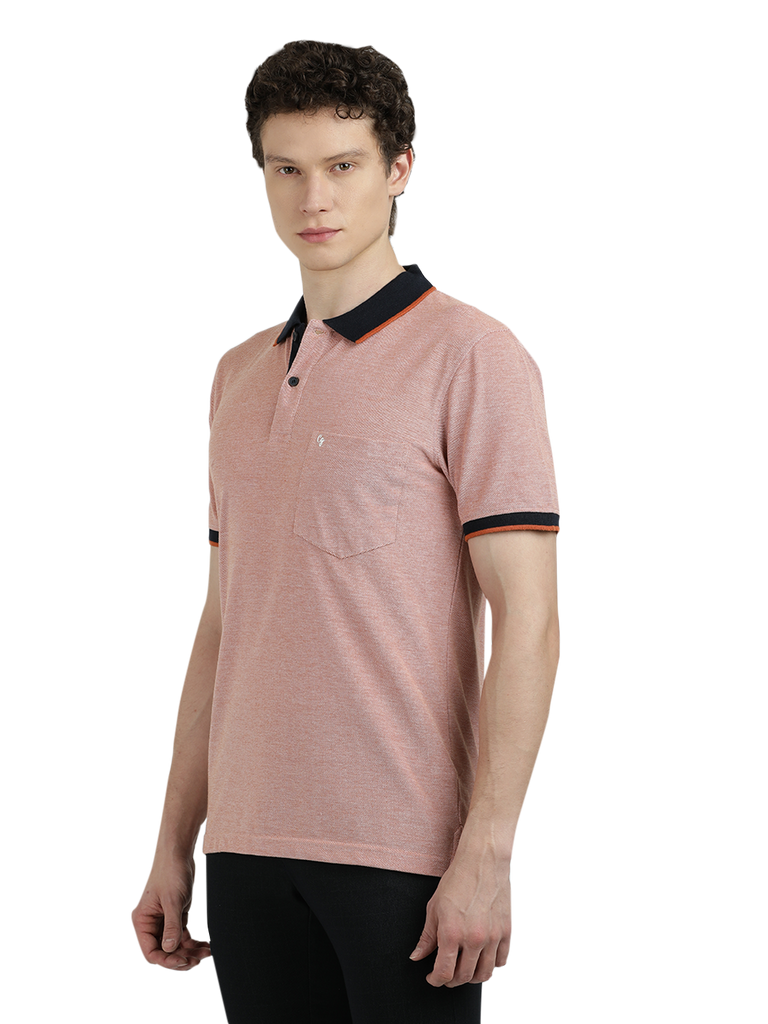 Model wearing Clarke Gable's Light Pink With Black Solid Polo Collar T-Shirt in a casual setting