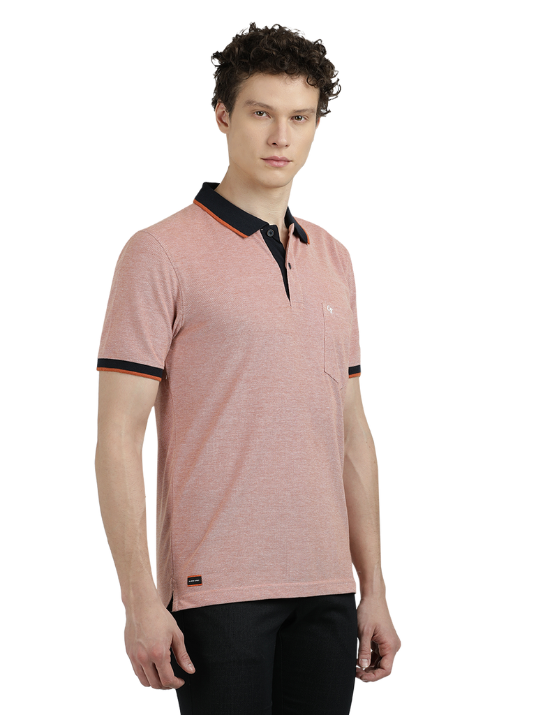 Model wearing Clarke Gable's Light Pink With Black Solid Polo Collar T-Shirt in a casual setting