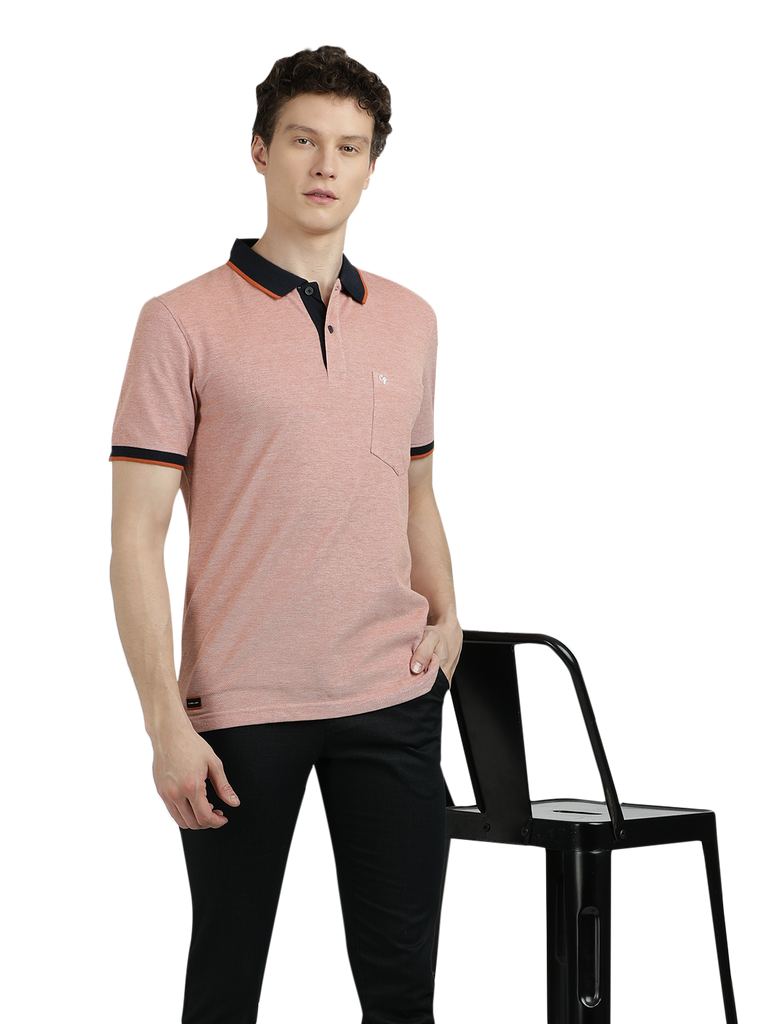 Model wearing Clarke Gable's Light Pink With Black Solid Polo Collar T-Shirt in a casual setting