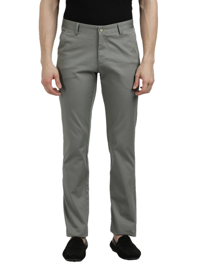 Model wearing Clarke Gable's Light Pista Custom Fit Trousers in a casual setting