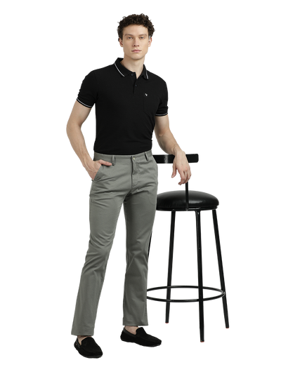 Model wearing Clarke Gable's Light Pista Custom Fit Trousers in a casual setting