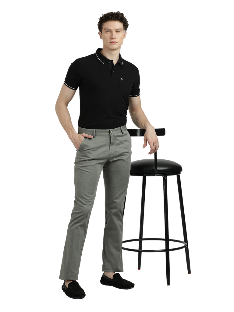 Model wearing Clarke Gable's Light Pista Custom Fit Trousers in a casual setting