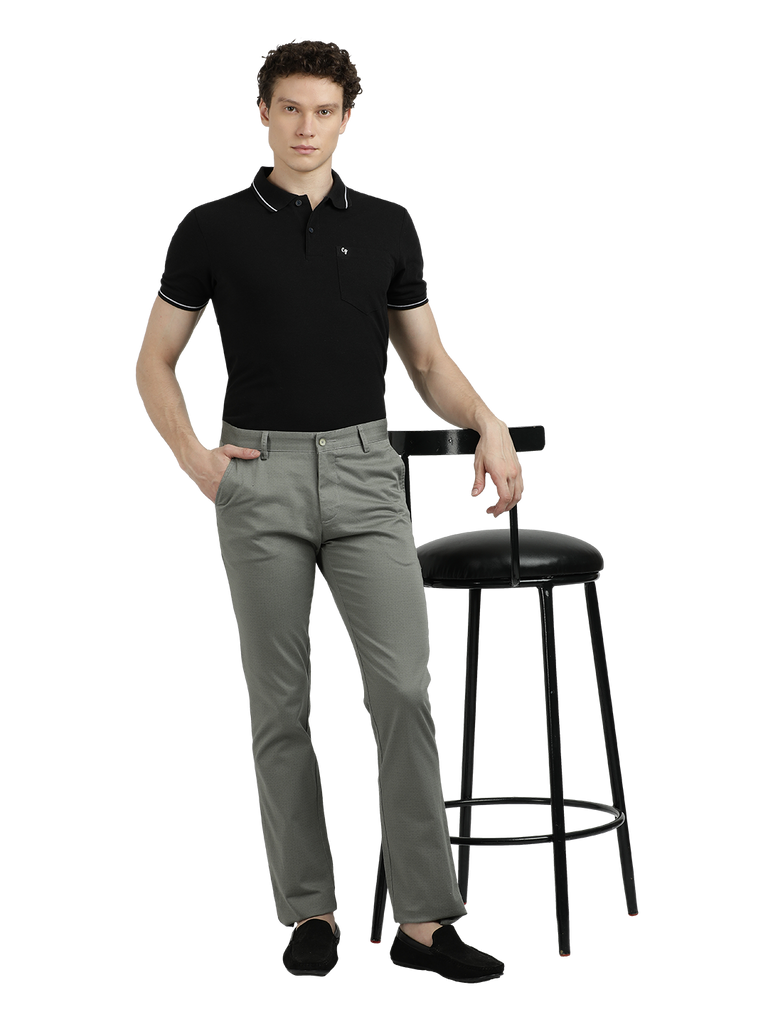 Model wearing Clarke Gable's Light Pista Custom Fit Trousers in a casual setting