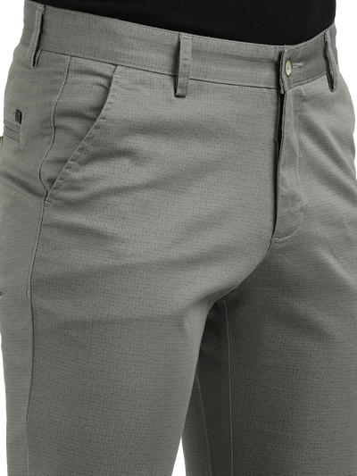 Model wearing Clarke Gable's Light Pista Custom Fit Trousers in a casual setting