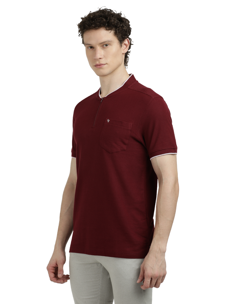 Model wearing Clarke Gable's Maroon Solid Henley Neck T-Shirt in a casual setting