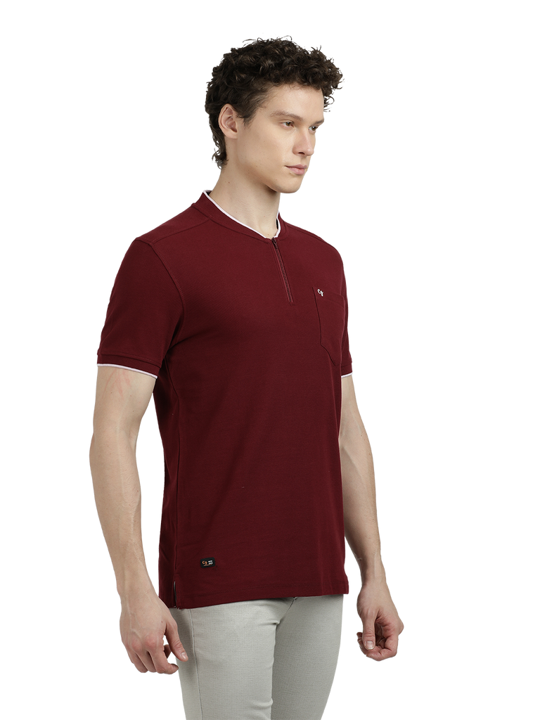 Model wearing Clarke Gable's Maroon Solid Henley Neck T-Shirt in a casual setting