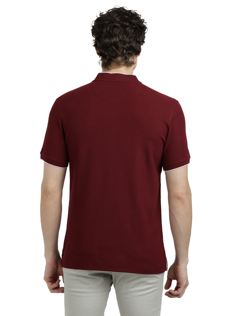 Model wearing Clarke Gable's Maroon Solid Henley Neck T-Shirt in a casual setting