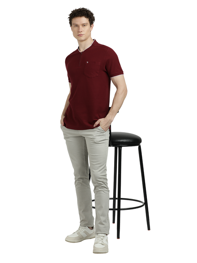 Model wearing Clarke Gable's Maroon Solid Henley Neck T-Shirt in a casual setting