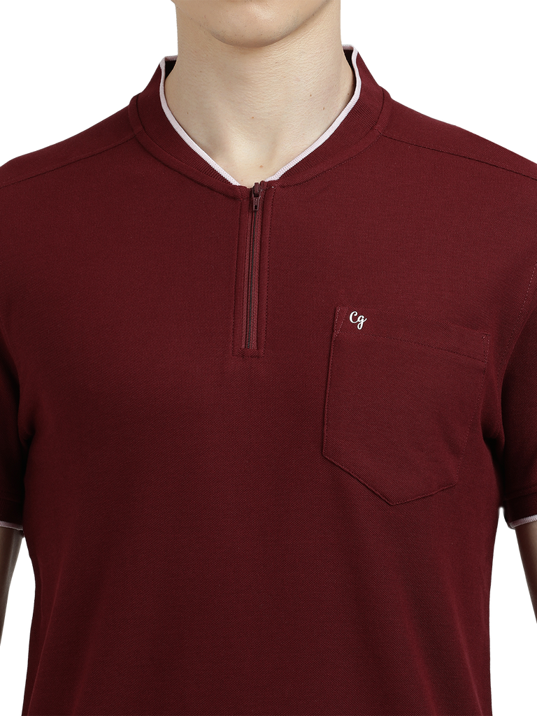 Model wearing Clarke Gable's Maroon Solid Henley Neck T-Shirt in a casual setting