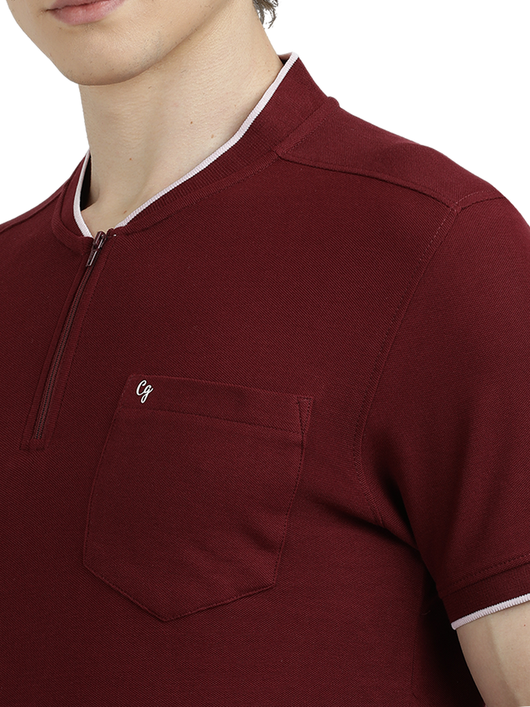 Model wearing Clarke Gable's Maroon Solid Henley Neck T-Shirt in a casual setting