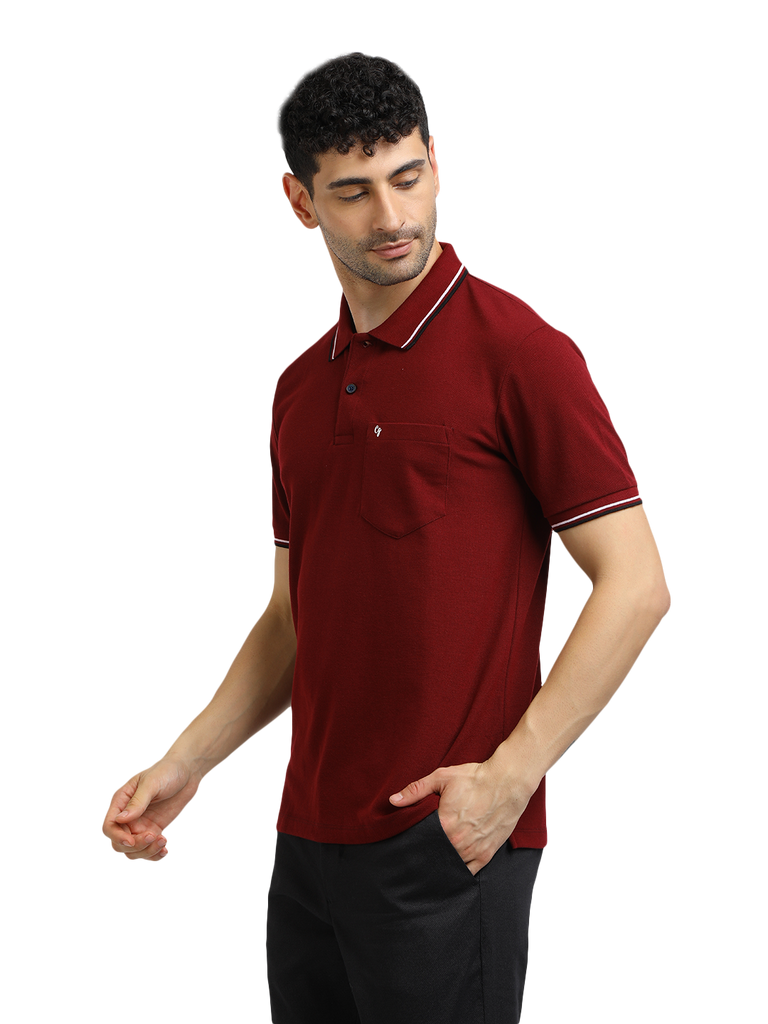 Model wearing Clarke Gable's Maroon Solid Polo Collar T-Shirt in a casual setting