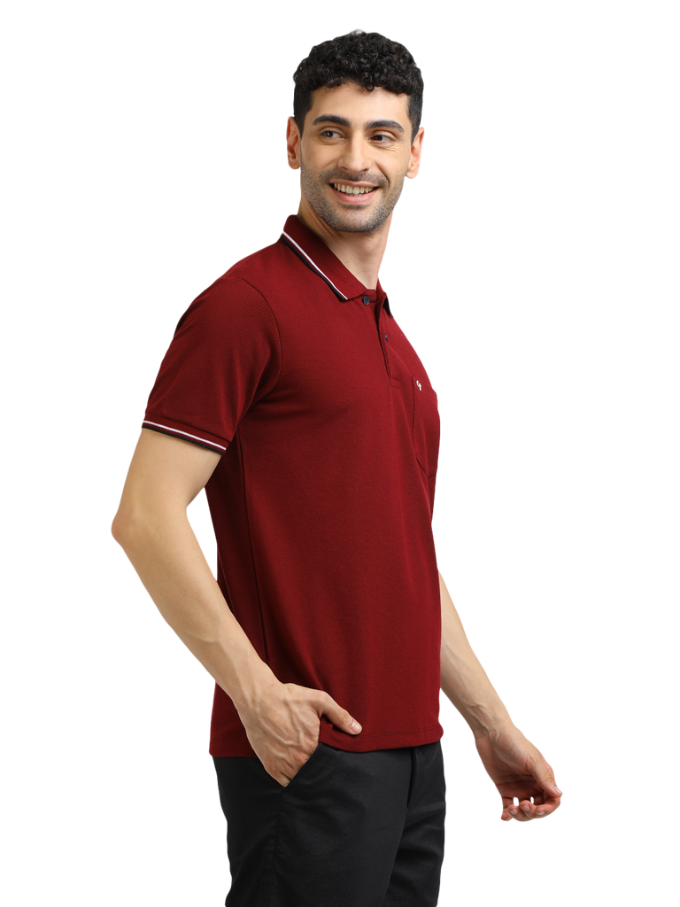 Model wearing Clarke Gable's Maroon Solid Polo Collar T-Shirt in a casual setting