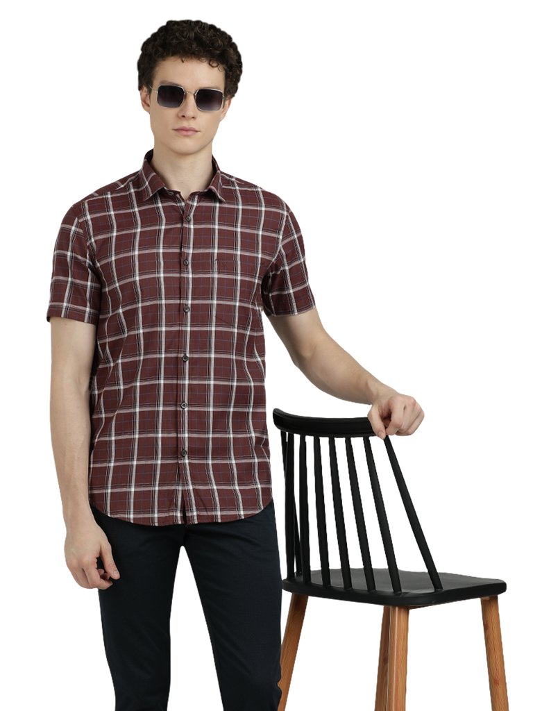 Model wearing Clarke Gable's Maroon With White Checked Semi Casual Shirt in a casual setting