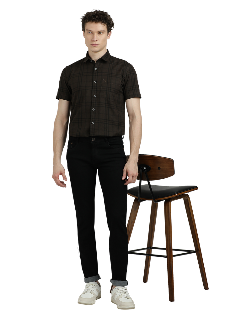 Model wearing Clarke Gable's Black Skinny Fit Jeans in a casual setting