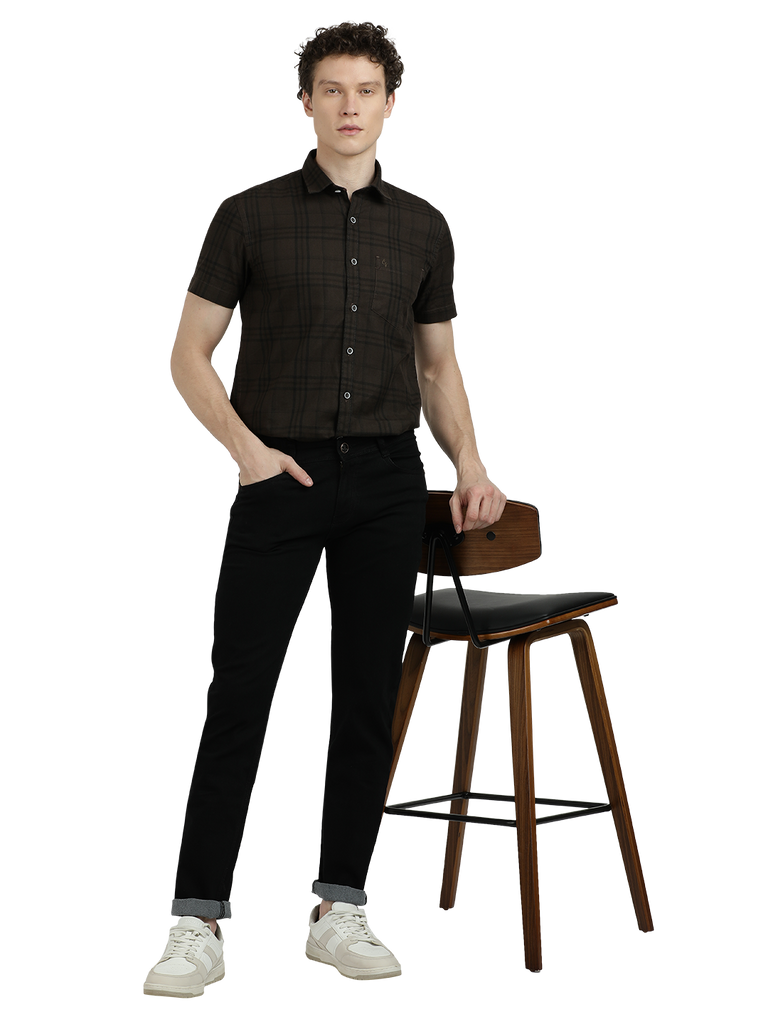 Model wearing Clarke Gable's Black Skinny Fit Jeans in a casual setting