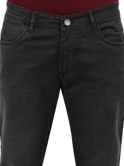 Model wearing Clarke Gable's Marvels Grey Skinny Fit Jeans in a casual setting