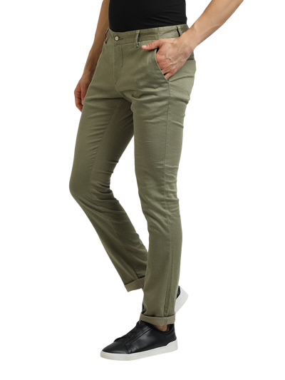 Model wearing Clarke Gable's Mint Trim Fit Trousers in a casual setting